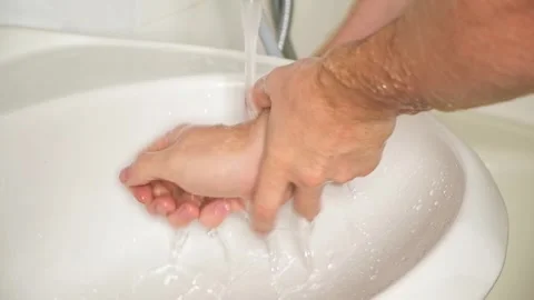 Man washes hhands with soap. Man hands in foam with bubbles Wash your hands Stock Footage 245209249