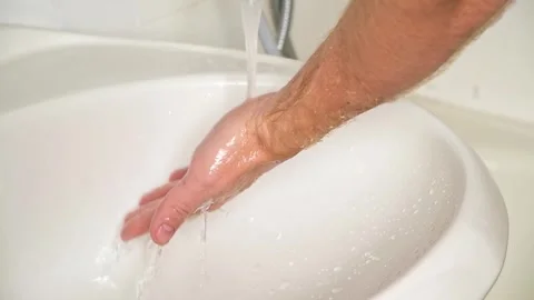 Man washes hhands with soap. Man hands in foam with bubbles Wash your hands Stock Footage 245657223
