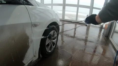 A man washes his car 스톡 동영상 104281887