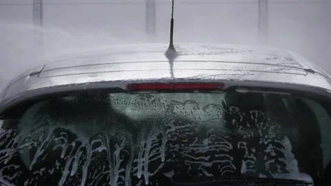 The man washes his car Stock Footage 248605309