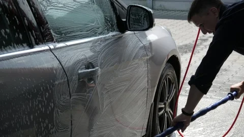 The man washes his car Stock-Footage 254118973
