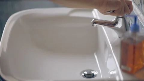 A man washes his hands Stock Footage 99951897