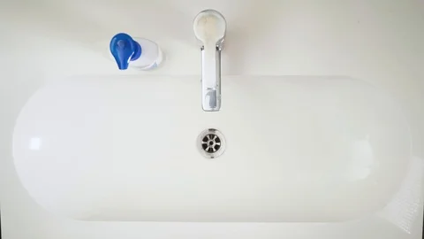 A man washes his hands. Stock Footage 128378585