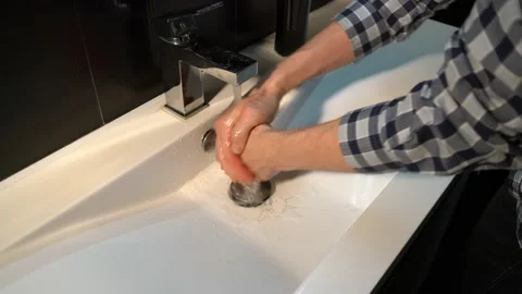 A man washes his hands Video stock 142907405