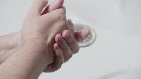 Man washes his hands Video stock 163364846