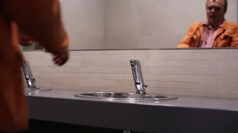 A Man Washes His Hands In The Sink Stock Footage 58252467