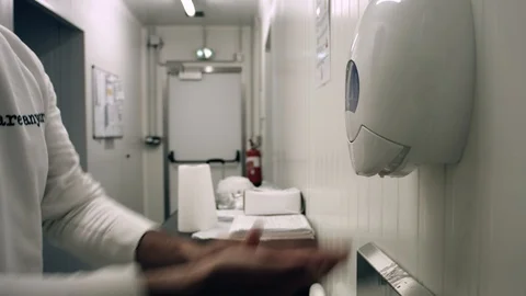 Man washes his hands with soap. We can see the man taking soap and rubbing his h Video stock 128410751