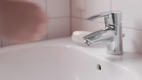 A man washes his hands with soap. Personal hygiene. Stock Footage 129597256