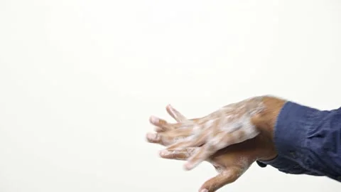 A man washes his hands with soap to protect virus isolated on a white background Stock Footage 144654056