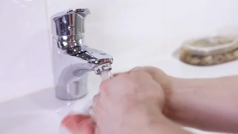 Man Washes His Hands with Soap in the Bathroom. Concept Personal Hygiene Stock Footage 153536488