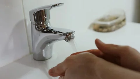 Man Washes His Hands with Soap in the Bathroom. Stock Footage 153539052