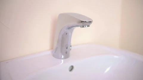 Man washes his hands under the tap Stock-Footage 64252639