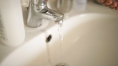 Man washes his hands under running water 스톡 동영상 116901448