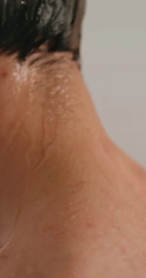 A man washes in the shower 스톡 동영상 287822357