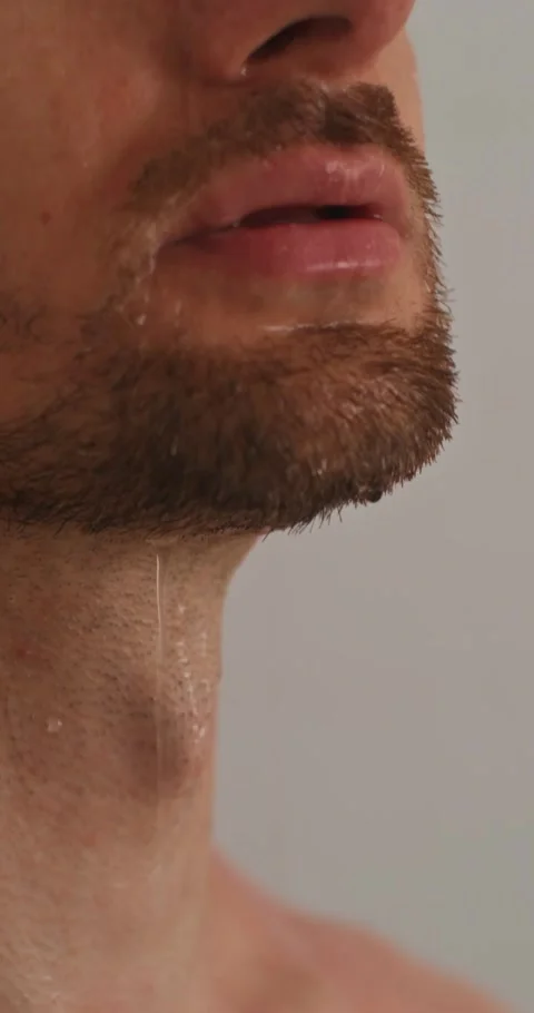 A man washes in the shower 스톡 동영상 287822507