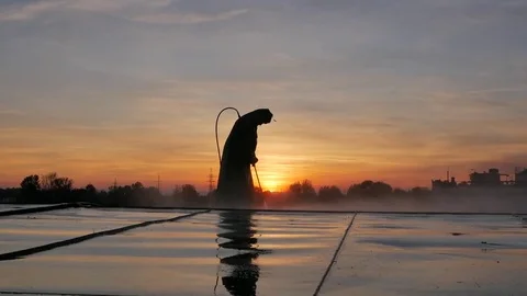 A man washes the surface of a barge Video stock 82926274