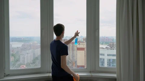 Man Washes a Window Video stock 109575122