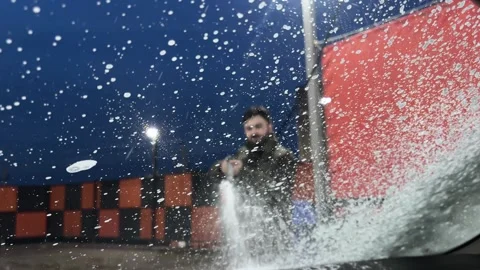 Man is washing car. View from inside the automobile. Close-up. Man is washing Stock Footage 271346411