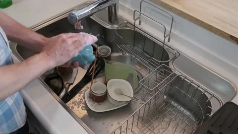 Man Washing Dishes Video stock 178229813
