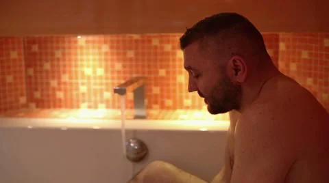 Man is washing face in bath  Stock Footage 61925935