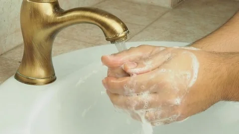Man washing hands with soap Stock Footage 71115245
