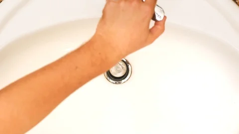 Man Washing Hands with Soap Under Water Tap. Corona Virus Protection Concept Stock Footage 127038006