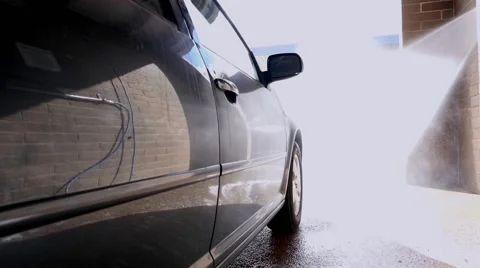 A man washing his car Stock Footage 58576322