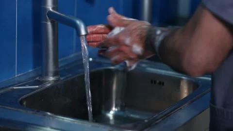 The man is washing his hands 2 Video stock 317083933