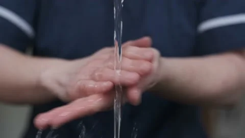 A man is washing his hands to clean and get rid of virus and impurities Video stock 138258564