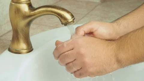 Man washing his hands Stock Footage 71034461
