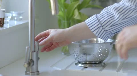 Man washing salad Stock Footage 22040720