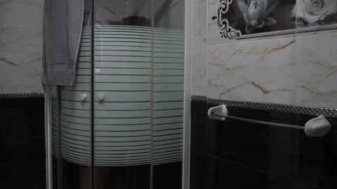 A man is washing in a shower cabin Stock Footage 101650746