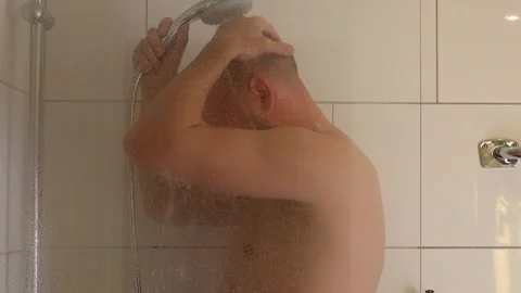 Man washing in the shower. Stock-Footage 243372193