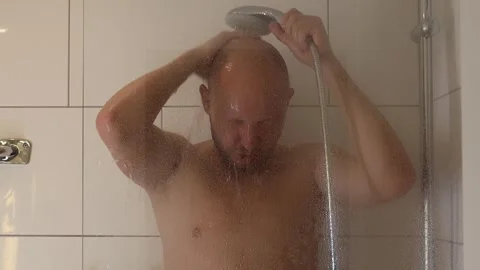 Man washing in the shower. Stock-Footage 243372220