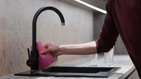 Man washing sink on the kitchen Stock Footage 234128948