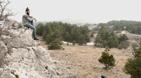 Man watch panorama on mountain Video stock 64576627