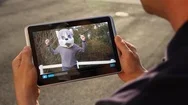 Man Watches Funny Furry On Tablet Pc	 	 Stock Footage