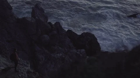 Man Watches the Ocean Stock Footage 101016178