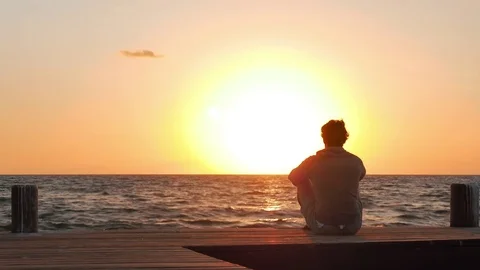 Man Watching a Dawn at the End of the Day Stock Footage 75069543