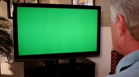 Man Watching Greenscreen TV Close Up 4K Stock Footage 40449203