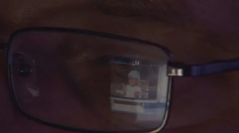 Man Watching his Child on Computer, Laptop, Surfing Internet in Night, Office Video stock 33549300