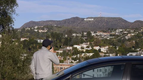 Man Watching Hollywood Sign Stock Footage