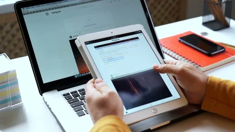 Man is watching Instagram on iPad tablet. Stock Footage 80640576