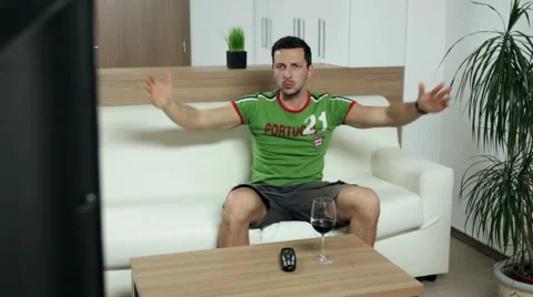 Man watching a match on TV. Stock Footage 47254902