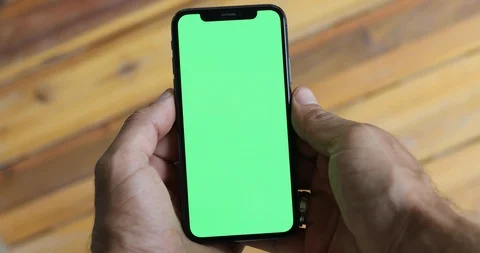 Man Watching A Smart Phone With Chroma Key Green Screen Stock Footage 120670468