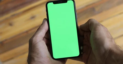 Man Watching A Smart Phone With Chroma Key Green Screen Stock Footage 120670474