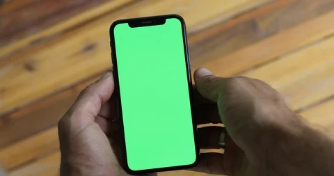 Man Watching A Smart Phone With Chroma Key Green Screen Stock Footage 120670490