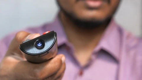 Man Watching Smart TV And Using Modern Black Remote Controller. Stock Footage 127873391