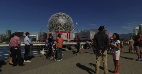 Man watching solar eclipse with giant telescope Stock Footage 79119058