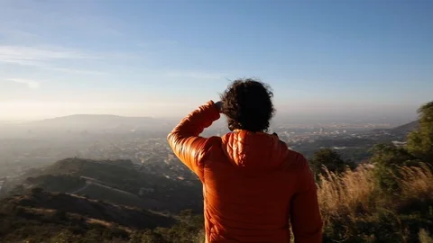 Man watching the sunrise Stock Footage 104123639